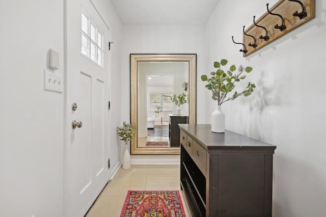 entryway featuring light tile patterned flooring