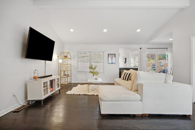 living room featuring dark hardwood / wood-style flooring, beamed ceiling, and high vaulted ceiling