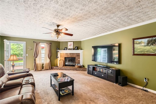 180 Moseley Crossing Dr, Stockbridge, GA 30281 - carpeted living area with a ceiling fan, ornamental molding, a fireplace, and a textured ceiling