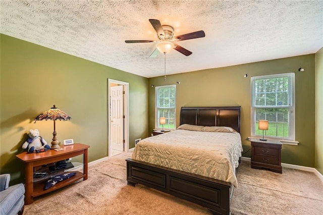 180 Moseley Crossing Dr, Stockbridge, GA 30281 - carpeted bedroom featuring a textured ceiling and ceiling fan