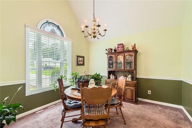 180 Moseley Crossing Dr, Stockbridge, GA 30281 - dining area with a chandelier, carpet, and high vaulted ceiling