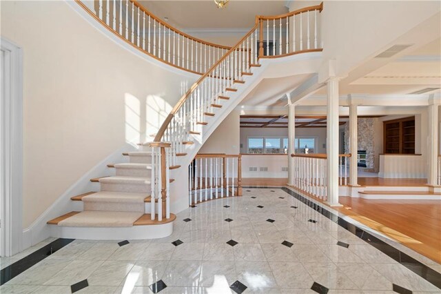 5414 Price Rd, Gainesville, GA 30506 - stairway with a high ceiling, visible vents, and baseboards