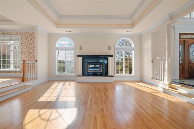 5414 Price Rd, Gainesville, GA 30506 - unfurnished living room featuring a fireplace, a raised ceiling, and wood finished floors
