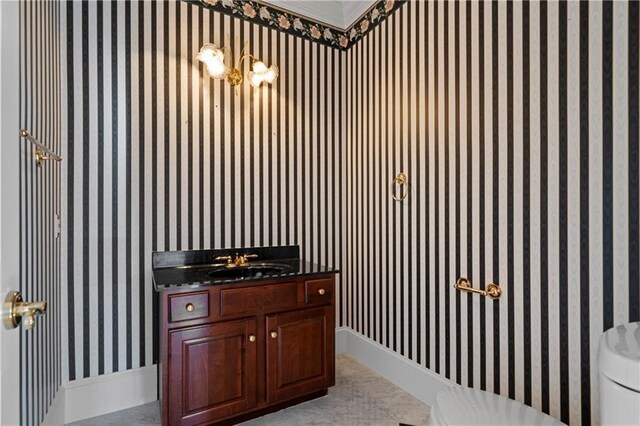 5414 Price Rd, Gainesville, GA 30506 - bathroom featuring baseboards, toilet, vanity, and wallpapered walls