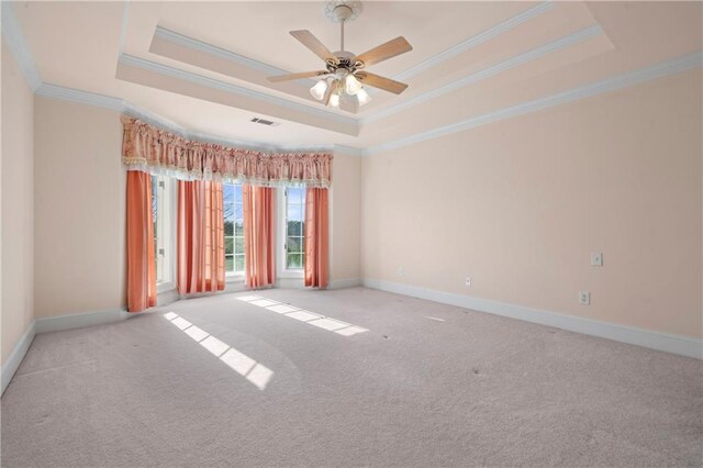 5414 Price Rd, Gainesville, GA 30506 - spare room featuring visible vents, ceiling fan, baseboards, carpet flooring, and a raised ceiling