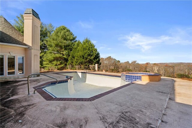 5414 Price Rd, Gainesville, GA 30506 - view of pool with a patio area, a pool with connected hot tub, and fence