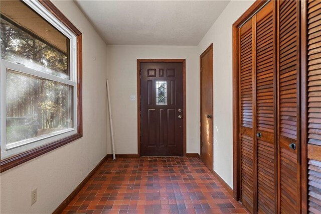 5414 Price Rd, Gainesville, GA 30506 - doorway with brick floor and baseboards