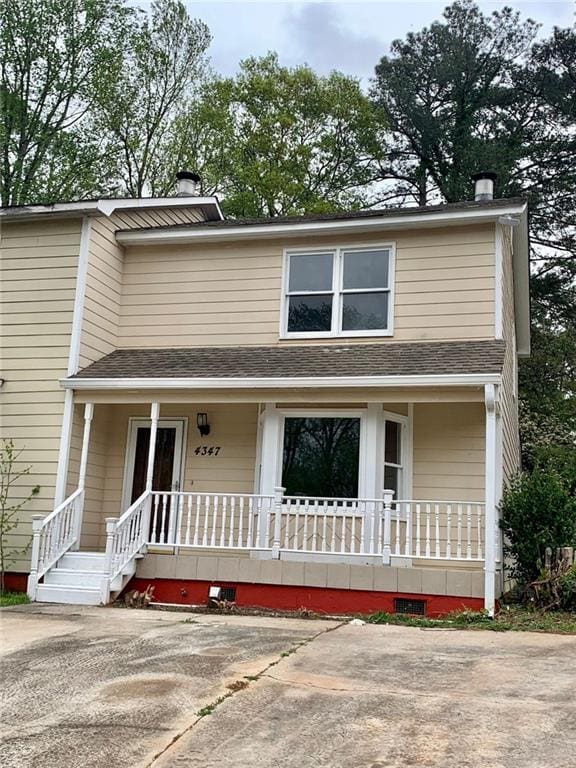 4347 Barrington Pl, Macon, GA 31210 - view of front of property with a porch, a chimney, and a shingled roof