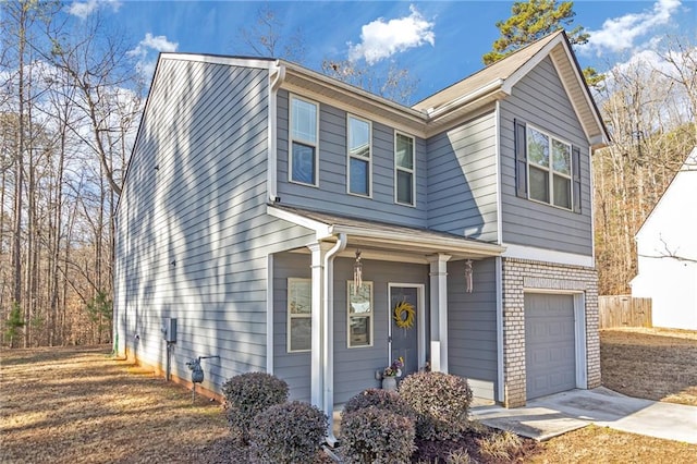 view of front of home with a garage