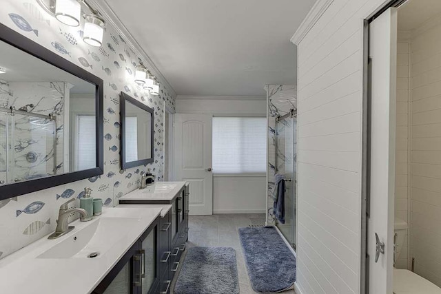 bathroom featuring an enclosed shower, vanity, and crown molding