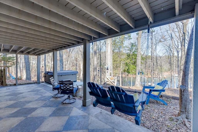 view of patio / terrace featuring a hot tub