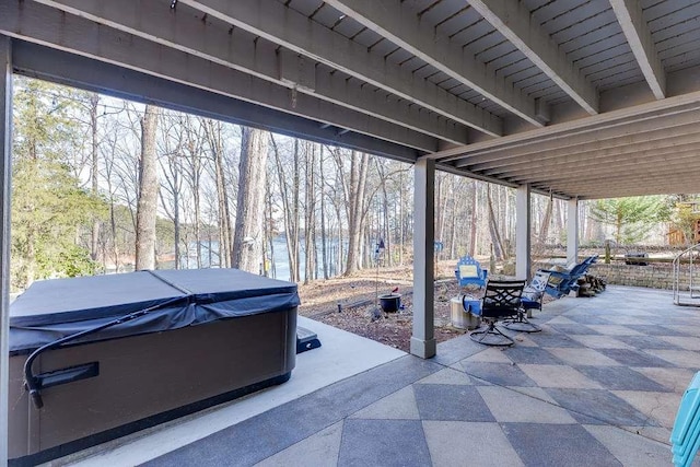 view of patio / terrace featuring a hot tub