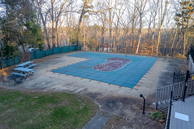 view of pool with a patio