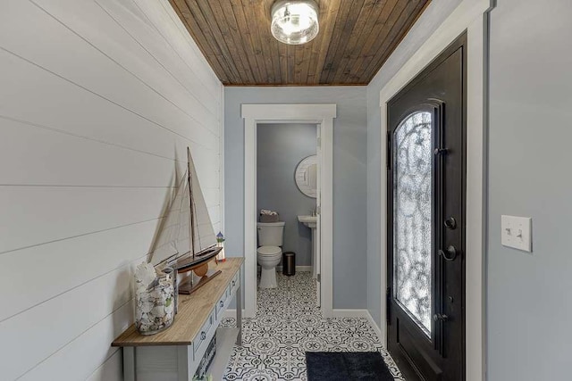 entryway with wood ceiling