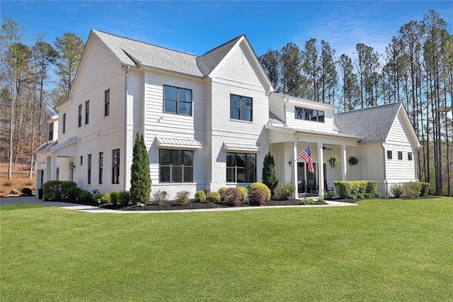 1455 Rucker Cir, Woodstock, GA 30188 - view of front of house featuring roof with shingles and a front yard