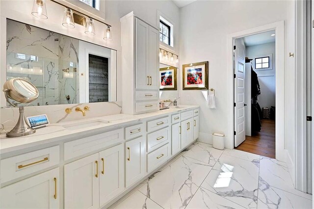 1455 Rucker Cir, Woodstock, GA 30188 - full bathroom with plenty of natural light, a marble finish shower, a sink, and marble finish floor