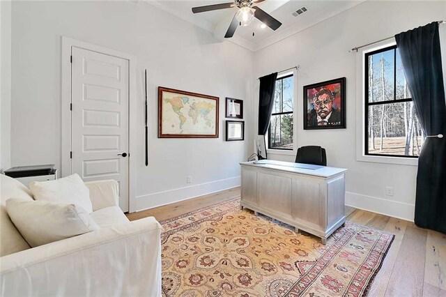 1455 Rucker Cir, Woodstock, GA 30188 - home office with ceiling fan, baseboards, light wood finished floors, and visible vents