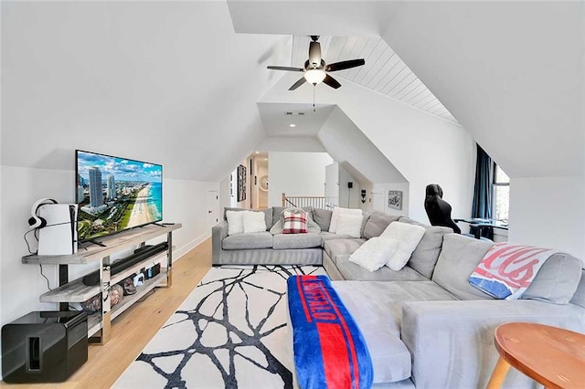 1455 Rucker Cir, Woodstock, GA 30188 - living room with vaulted ceiling, a ceiling fan, and light wood-style flooring