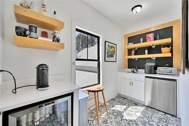 1455 Rucker Cir, Woodstock, GA 30188 - interior space with beverage cooler, a dry bar, refrigerator, and a sink