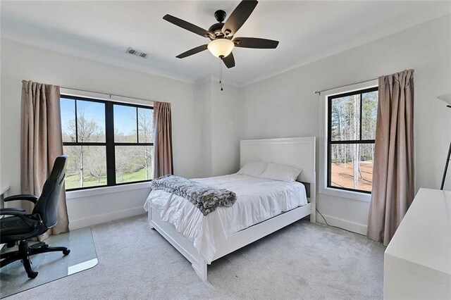 1455 Rucker Cir, Woodstock, GA 30188 - bedroom featuring ceiling fan, light carpet, visible vents, and baseboards