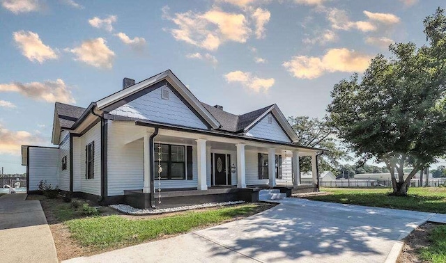 view of front of home featuring covered porch