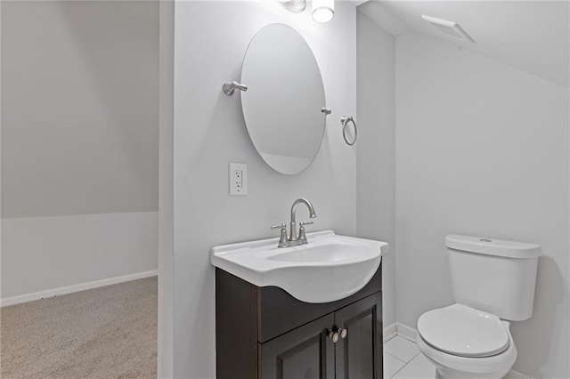 1974 Browns Mill Rd SE, Atlanta, GA 30315 - bathroom featuring vanity, toilet, and baseboards