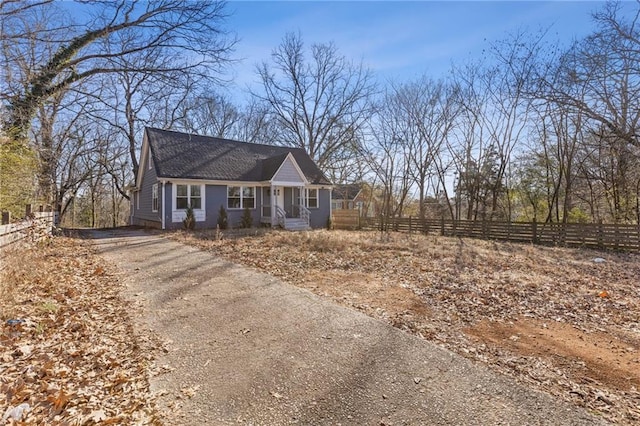 1974 Browns Mill Rd SE, Atlanta, GA 30315 - view of front of home with asphalt driveway and roof with shingles