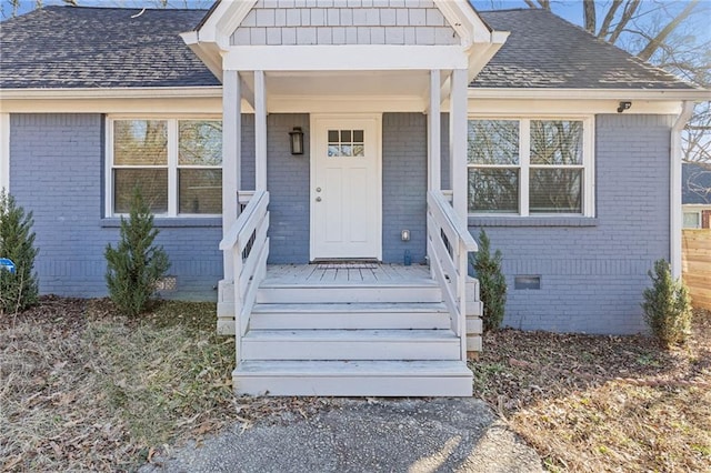 1974 Browns Mill Rd SE, Atlanta, GA 30315 - property entrance with brick siding, roof with shingles, and a porch