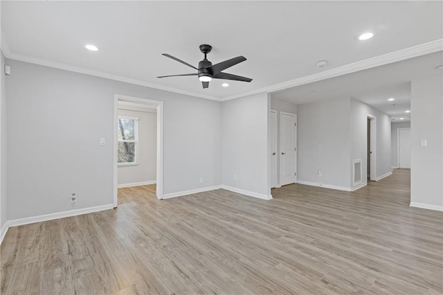 unfurnished room featuring crown molding, ceiling fan, and light wood-type flooring