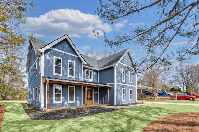 474 Maxwell Rd, Roswell, GA 30075 - view of front of home with covered porch, a front yard, and roof with shingles