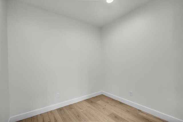 474 Maxwell Rd, Roswell, GA 30075 - unfurnished room with baseboards and light wood-style flooring