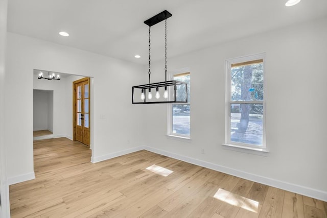 474 Maxwell Rd, Roswell, GA 30075 - unfurnished dining area with a chandelier, light wood-type flooring, and recessed lighting