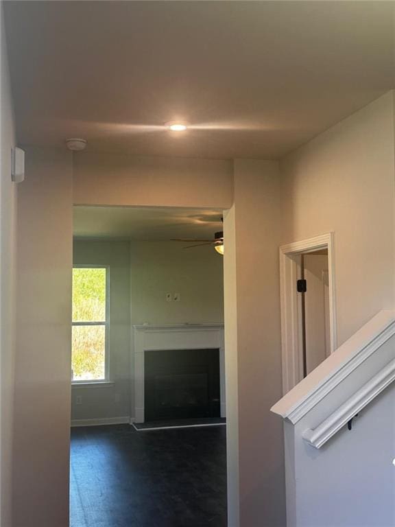 corridor featuring baseboards