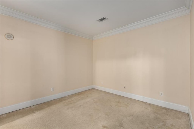 carpeted empty room with ornamental molding