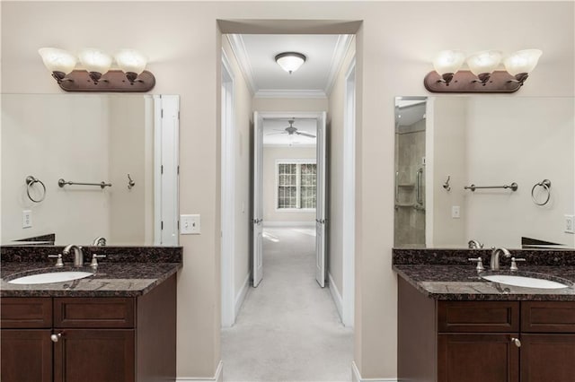 bathroom featuring vanity and ornamental molding