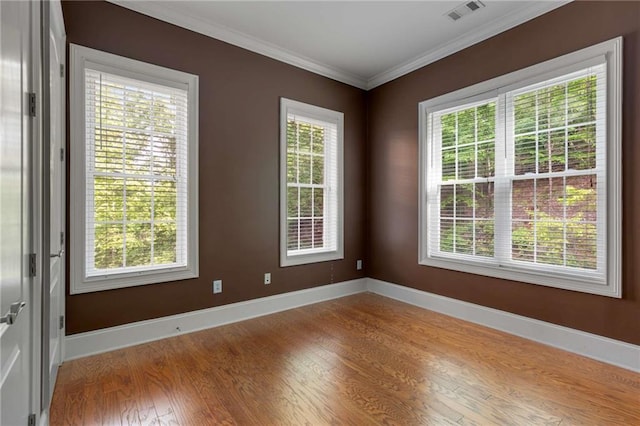 bathroom featuring a whirlpool tub, a stall shower, vanity, baseboards, and ornamental molding
