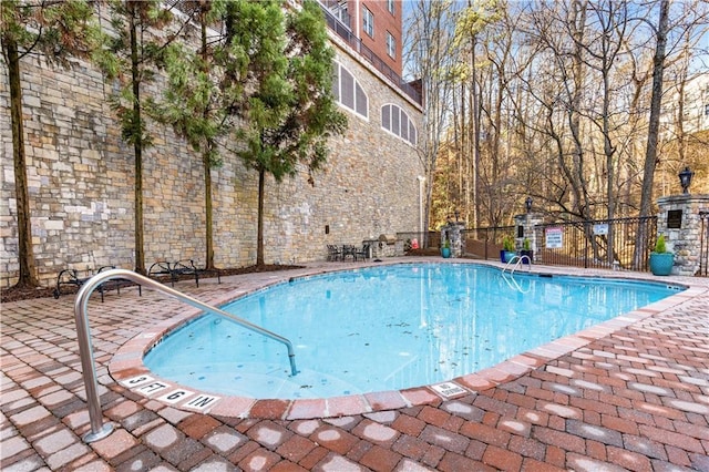 view of pool featuring a patio