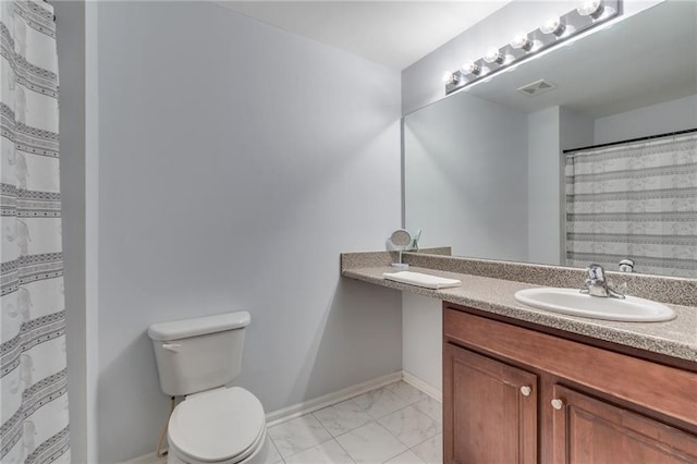 bathroom with toilet, vanity, marble finish floor, baseboards, and visible vents