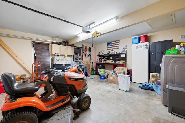 garage with a garage door opener and refrigerator