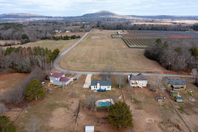 bird's eye view featuring a mountain view and a rural view