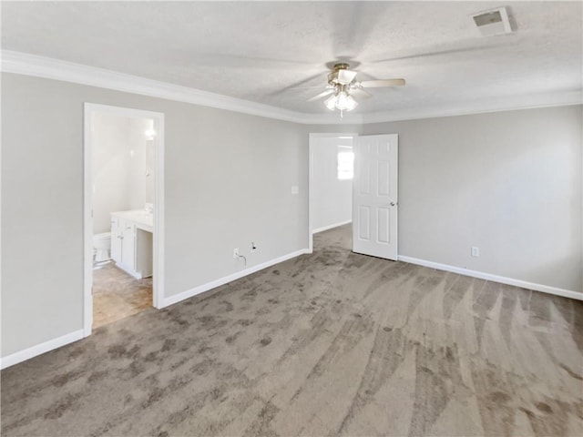 unfurnished room with ceiling fan, carpet flooring, and ornamental molding