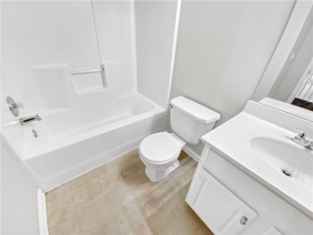 full bathroom featuring washtub / shower combination, vanity, and toilet