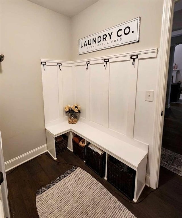 mudroom featuring dark wood-type flooring