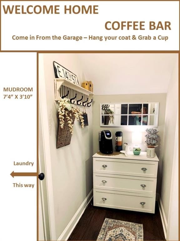 mudroom featuring dark wood-type flooring