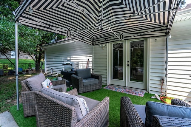 view of patio / terrace featuring outdoor lounge area and french doors