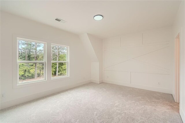 2625 Beverly Ln, Snellville, GA 30078 - additional living space with light colored carpet and baseboards