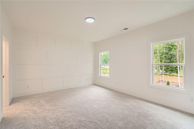 2625 Beverly Ln, Snellville, GA 30078 - spare room featuring carpet floors and baseboards