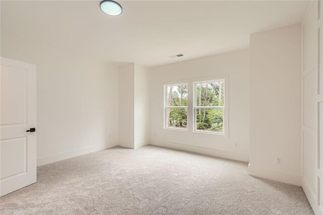 2625 Beverly Ln, Snellville, GA 30078 - unfurnished room with light colored carpet and baseboards