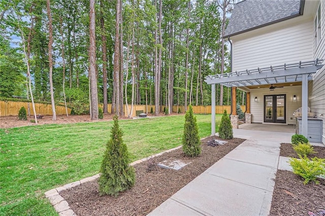 2625 Beverly Ln, Snellville, GA 30078 - view of yard with french doors, a pergola, and a patio area