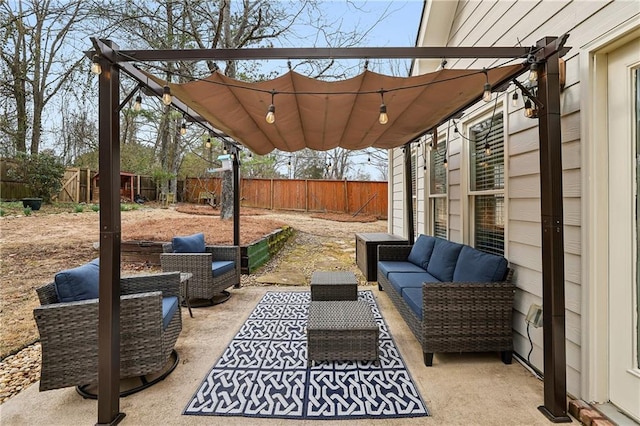 view of patio with a fenced backyard and an outdoor living space